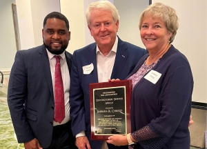 President Marcus Allen Shields, Tom Watkins, and Barbara R. Christy